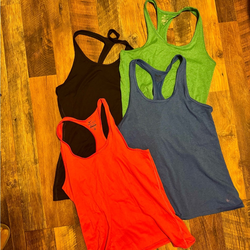Set of Four Nike Racerback Tanks in Black, Red, Green, and Blue